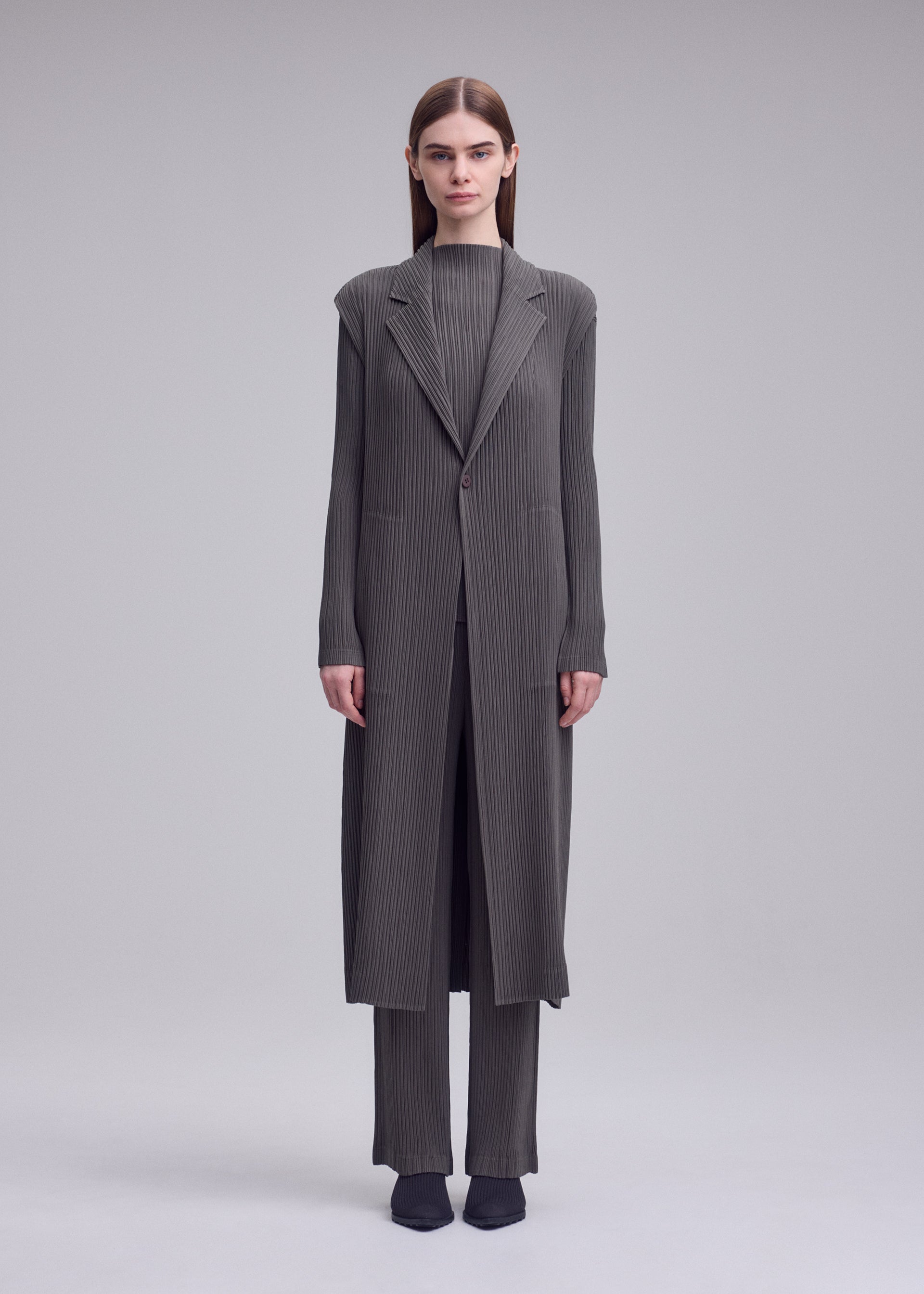【ハート イッセイミヤケ】パッチワーク調 ジャガード織り ブーツカット パンツ HATCHING PLEATS – isseymiyake.com